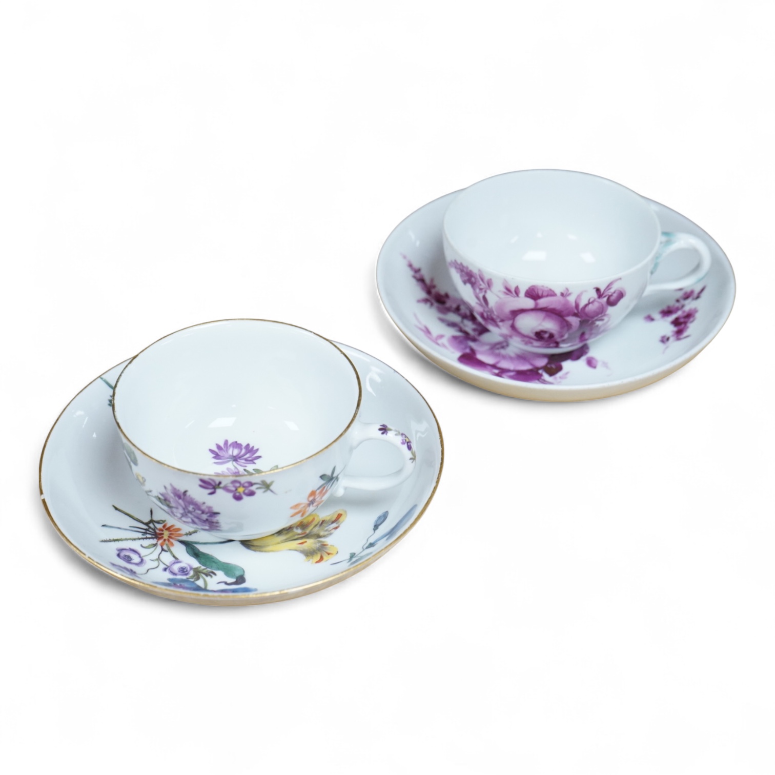 Two 18th century Meissen floral decorated teacups and saucers, largest saucer 13.5cm diameter